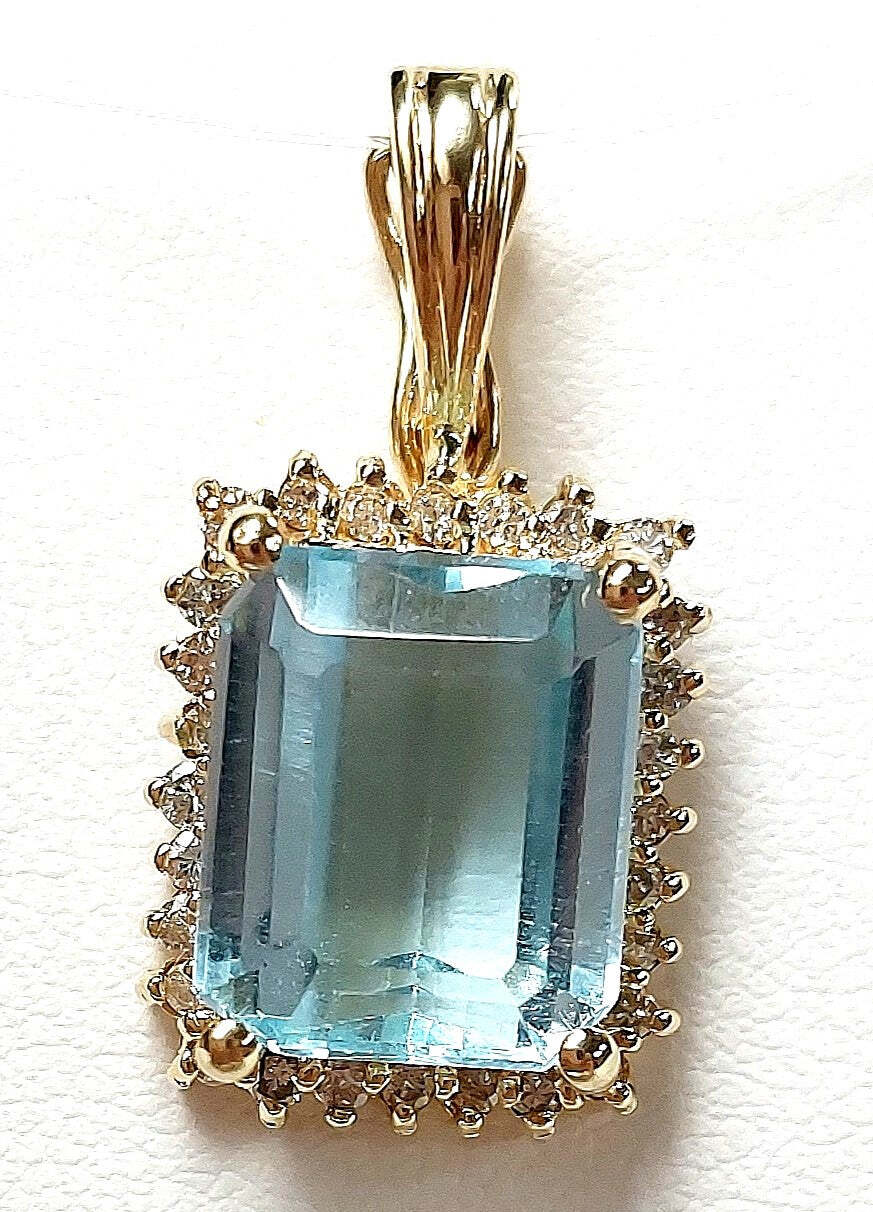 14K Yellow Gold Sky Blue Topaz and Diamond Pendant