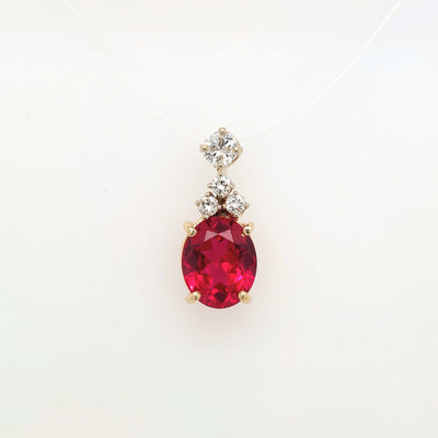 14K Yellow Gold Oval 11x9mm Lab-Grown Ruby Pendant w/ approx. 0.59ctTW H-I/SI1 Diamond Accents 2.6g