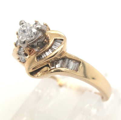 14K Yellow Gold Heart shape, RBC, & baguette diamond ring .50ctTW approximately, 4.0g size 7.25