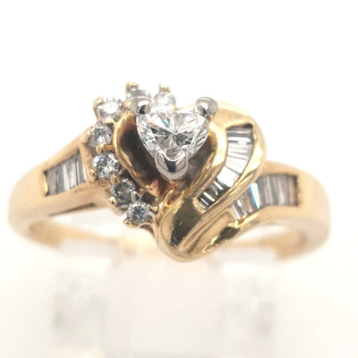 14K Yellow Gold Heart shape, RBC, & baguette diamond ring .50ctTW approximately, 4.0g size 7.25