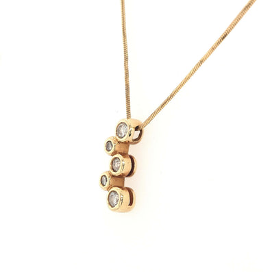 14K Yellow Gold Diamond Journey Pendant on a 10K Yellow Gold 18in Snake Chain 0.75mm Gram Weight:3.5g