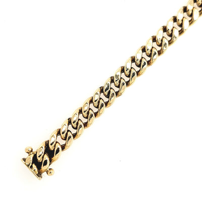 10K Yellow Gold 6.7mm Curb Link Bracelet Length:8in Gram Weight:10.5g