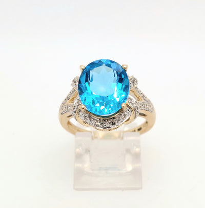 10 Karat Yellow Gold Blue Topaz Ring with Diamond Accent Stones