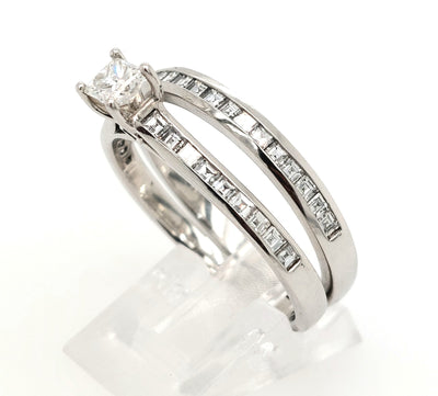 Platinum Wed Set: Engagement Ring: 1.45ctTW of H-I/SI1 diamonds, .25ct center, 1.20 side diamonds. Size: 11½