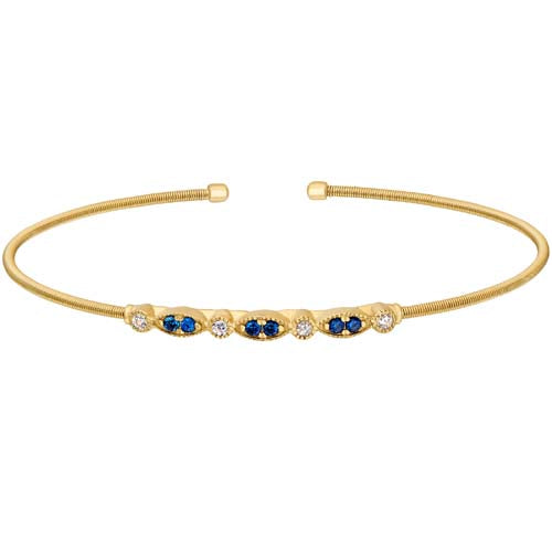 Gold Finish Sterling Silver Cable Cuff Bracelet With Simulated Blue Sapphire And Simulated Diamond Marquis & Round Design
