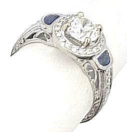 14KW .90ct RBC H/I1 center w/ GIA Rpt#2195481594 w/ .29ct of blue sapphires & .44ct G/SI2 of accent diamonds