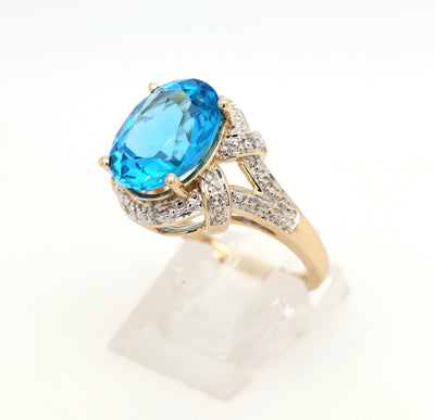 10 Karat Yellow Gold Blue Topaz Ring with Diamond Accent Stones